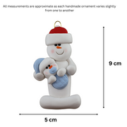 Family ornament with 1 large and 1 infant snowman in blue, graphed to show size (5x9cm).