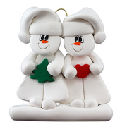 Family ornament with 2 white snowmen in hats, holding holiday objects.