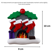 Vibrant fireplace ornament with holly and Christmas presents, displaying 6 red stockings, graphed to show size (9x10cm).