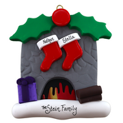 Vibrant fireplace ornament with holly and Christmas presents, displaying 2 red stockings, personalized with names.