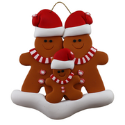 Family ornament with 3 brown gingerbread figures in red Christmas hats.