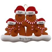 Family ornament with 4 brown gingerbread figures in red Christmas hats, personalized with names.