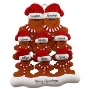 Family ornament with 8 brown gingerbread figures in red Christmas hats, personalized with names.