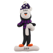 Penguin wearing purple hat and scarf ornament, personalized with name.