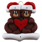 A couple’s ornament of two brown bears holding a red heart together, numbered 1-3 for personalization.