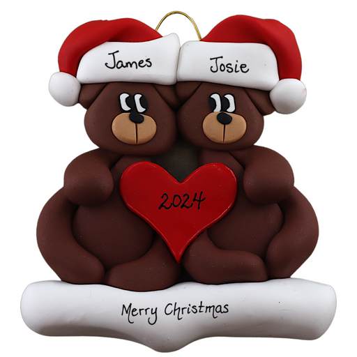 A couple’s ornament of two brown bears holding a red heart together, personalized with names.