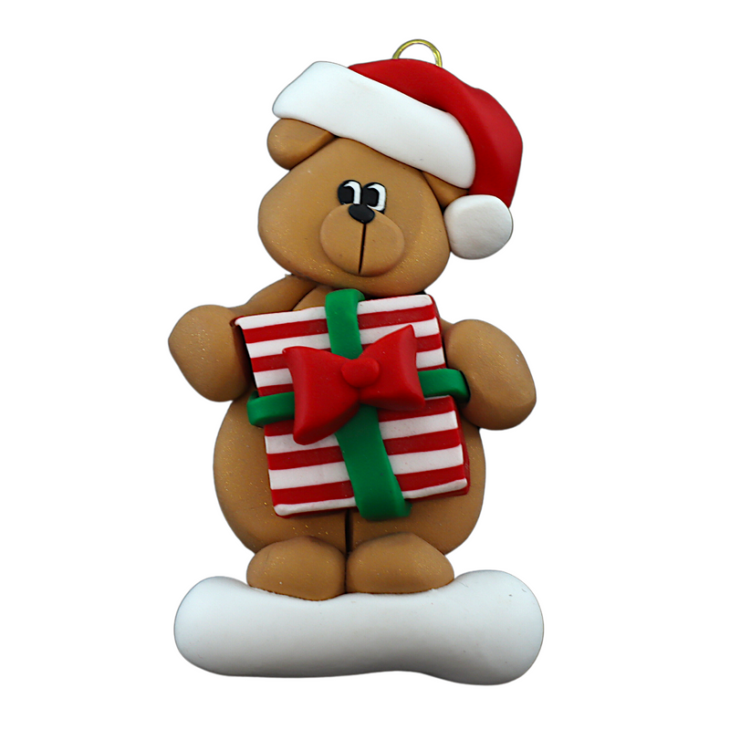 Tan bear in red festive hat holding colourful present ornament.