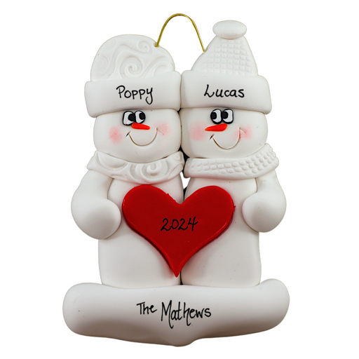 A couple’s ornament of two white snowmen holding a red heart together, personalized with names.