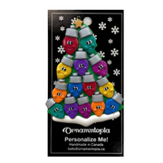 Christmas tree ornament decorated with 14 light bulbs with smiling faces, on display backing card.