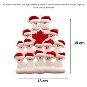 Family ornament with 14 white snowmen in red hats, gathered around a red maple leaf, graphed to show size (13x15cm).