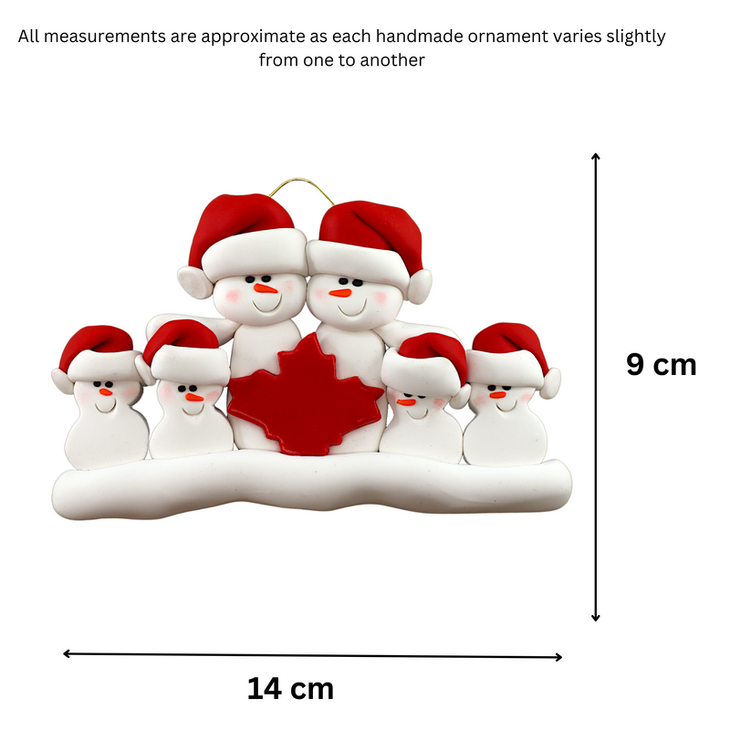 Family ornament with 6 white snowmen in red hats, gathered around a red maple leaf, graphed to show size (14x9cm).