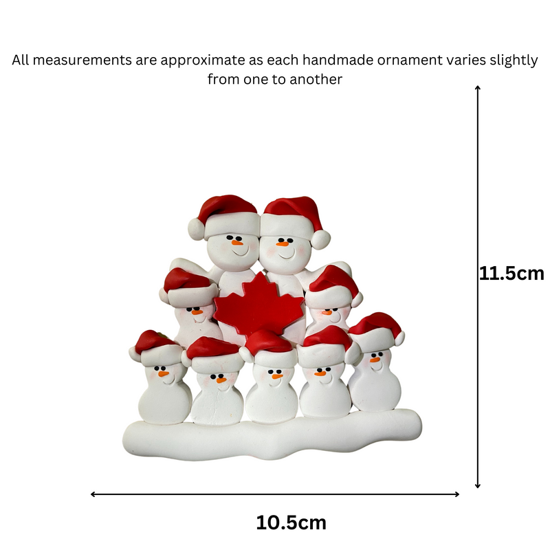 Family ornament with 9 white snowmen in red hats, gathered around a red maple leaf, graphed to show size (10.5x11.5cm).