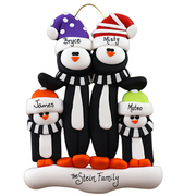 Family ornament with 4 black and white penguins in colourful festive hats, personalized with names.