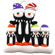 Family ornament with 5 black and white penguins in colourful festive hats.