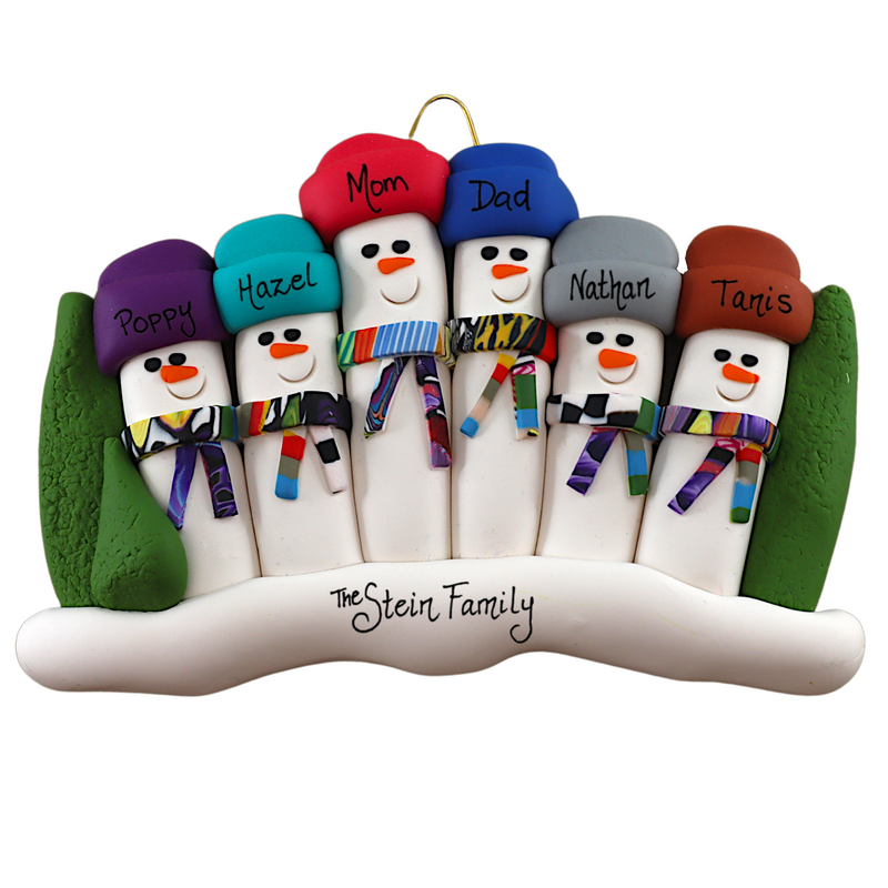 Family ornament with 6 snowmen in colourful scarves and hats, hemmed by Christmas trees, personalized with names.