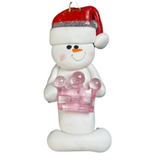 Ornament of white snowman in red hat holding a pink plastic crown.