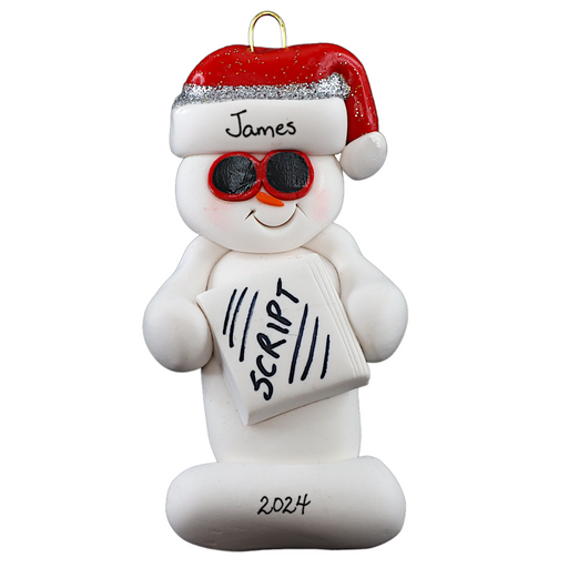 Ornament of white snowman in red hat and sunglasses holding a movie script, personalized with name.