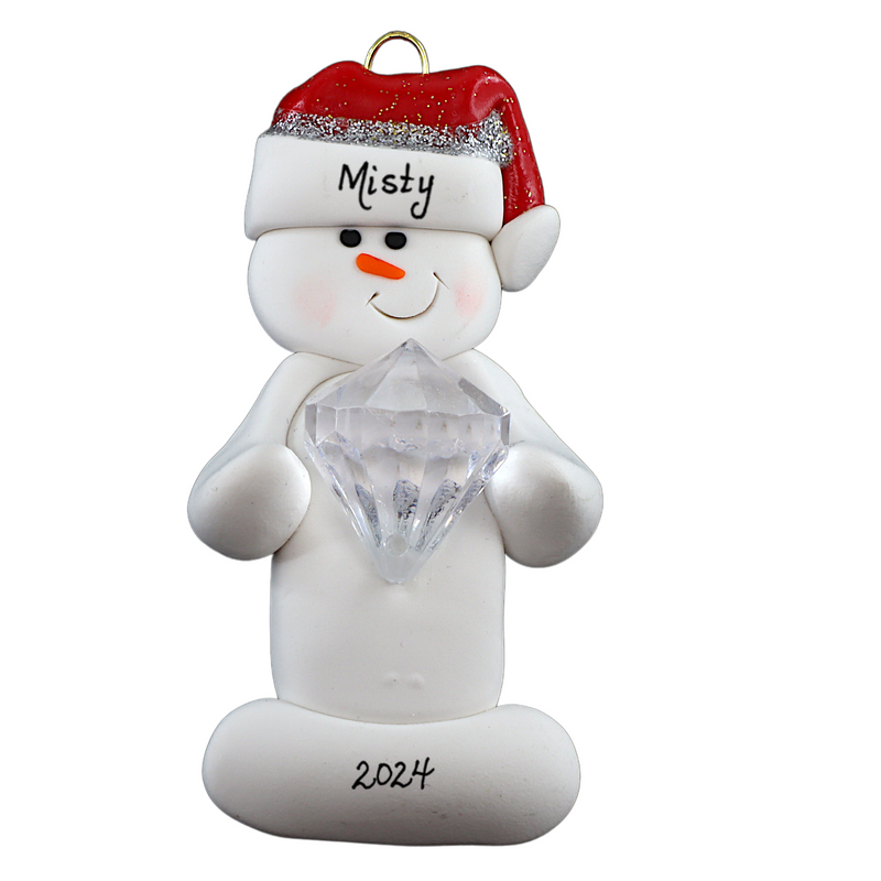 Ornament of white snowman in red hat holding large plastic diamond, personalized with name.