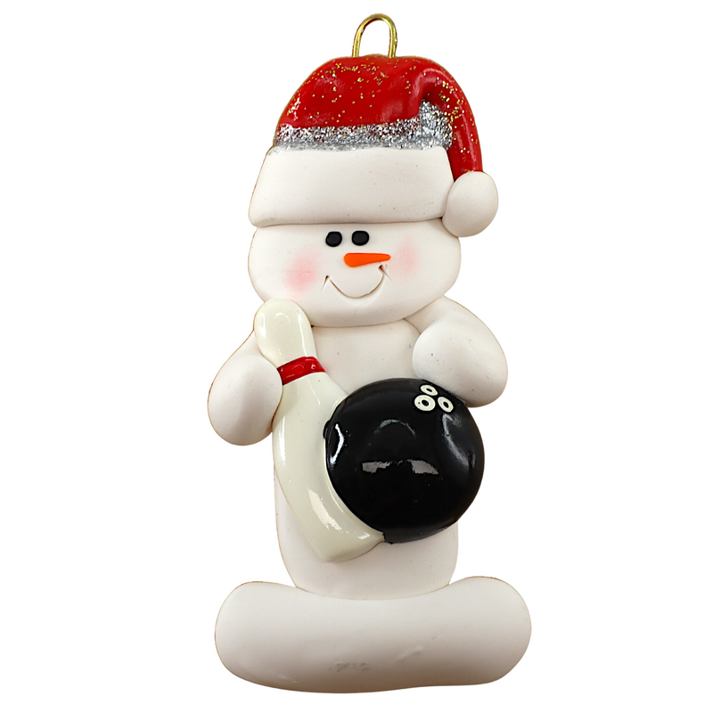 Ornament of white snowman in red hat holding a black bowling ball and pin.