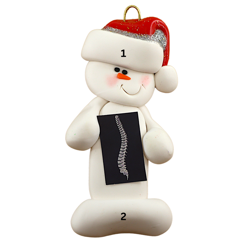 Ornament of white snowman in red hat holding black and white x-ray of a spine, numbered 1-2 for personalization.