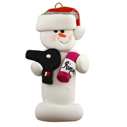 Ornament of white snowman in red hat holding a hairdryer and bottle of hair product.
