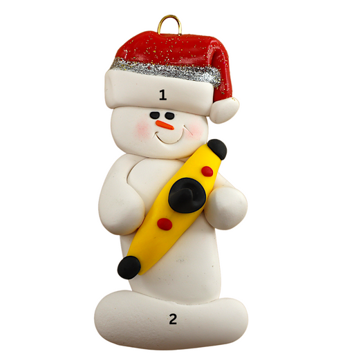 Ornament of white snowman in red hat holding a yellow kayak, numbered 1-2 for personalization.