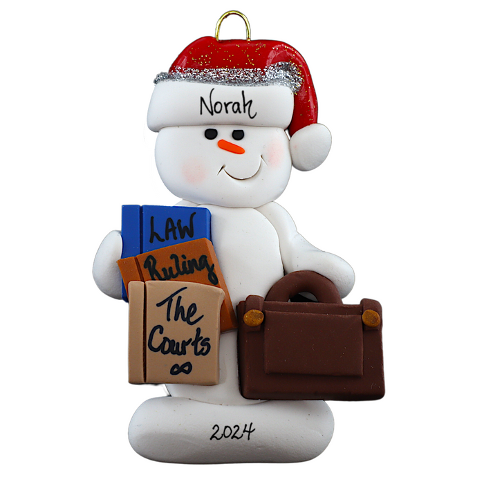 Ornament of white snowman in red hat holding a briefcase and law books, personalized with name.
