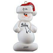 Ornament of white snowman in red hat with a round stomach that says “baby”, personalized with name.
