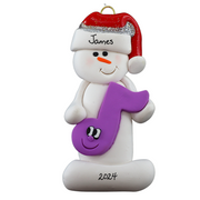Ornament of white snowman in red hat holding a purple musical note, personalized with name.