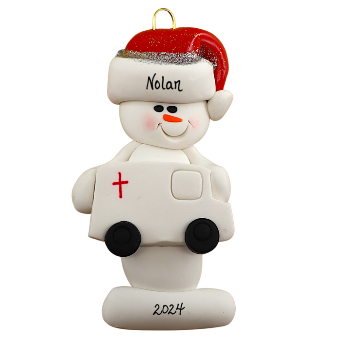 Ornament of white snowman in red hat holding a white ambulance, personalized with name.