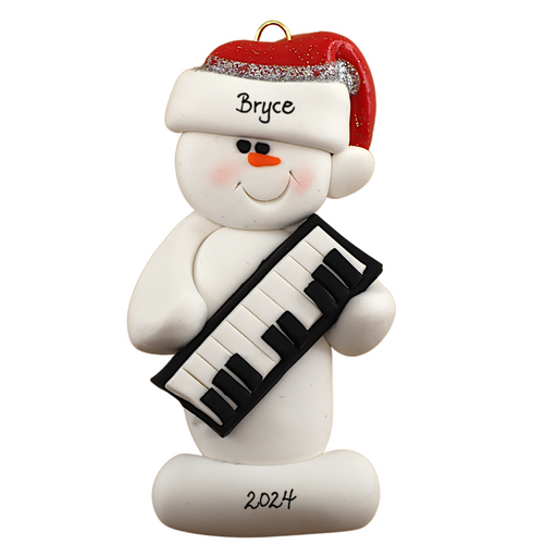 Ornament of white snowman in red hat holding a piano keyboard, personalized with name.