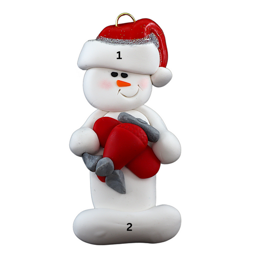 Ornament of white snowman in red hat holding a red airplane, numbered 1-2 for personalization.