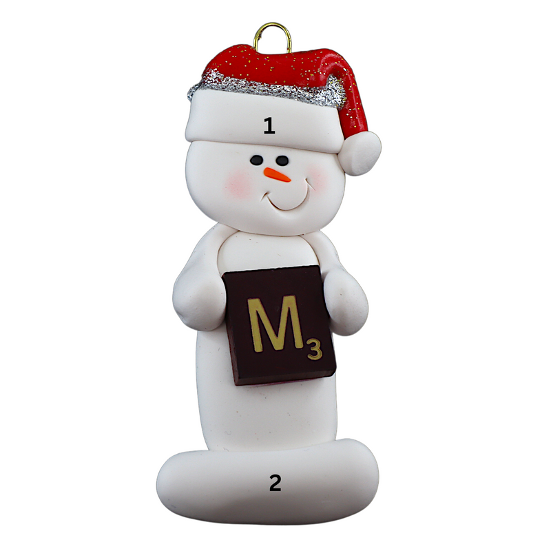 Ornament of white snowman in red hat holding a scrabble tile, numbered 1-2 for personalization.