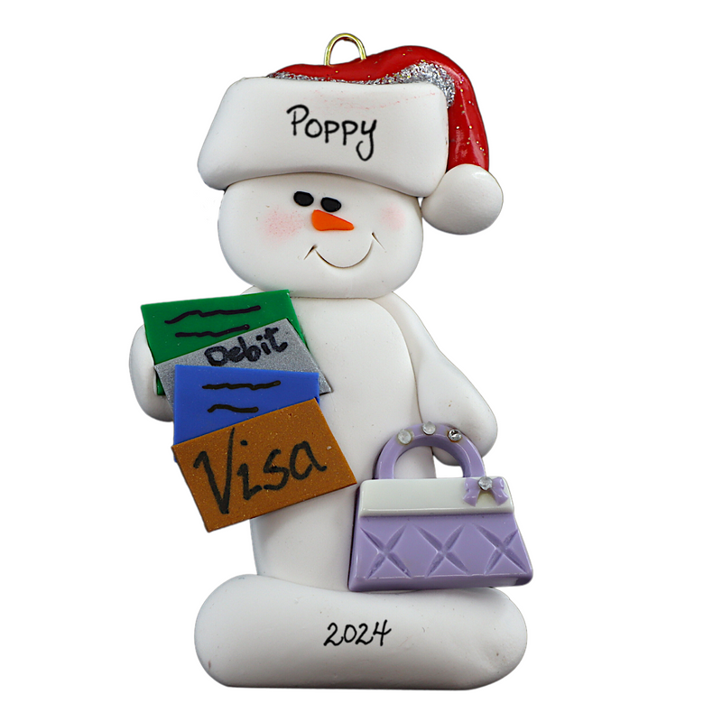 Ornament of white snowman in red hat holding a purse and various bank cards, personalized with name.