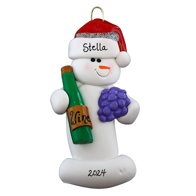 Ornament of white snowman in red hat holding a cluster of grapes and a wine bottle, personalized with name.