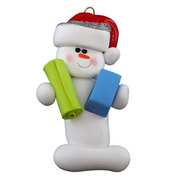 Ornament of white snowman in red hat holding vibrant yoga mat and block.