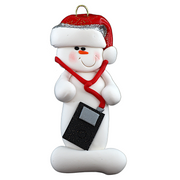 Ornament of white snowman in red hat holding an i-pod with headphones.