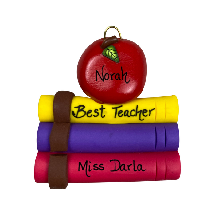 Stack of books and red apple teacher appreciation ornament, personalized with name.