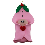 Ornament with an infant head poking out of a pink baby blanket, numbered 1-3 for personalization.