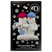 Family ornament with 2 large and 1 infant snowman in blue, on display backing card.