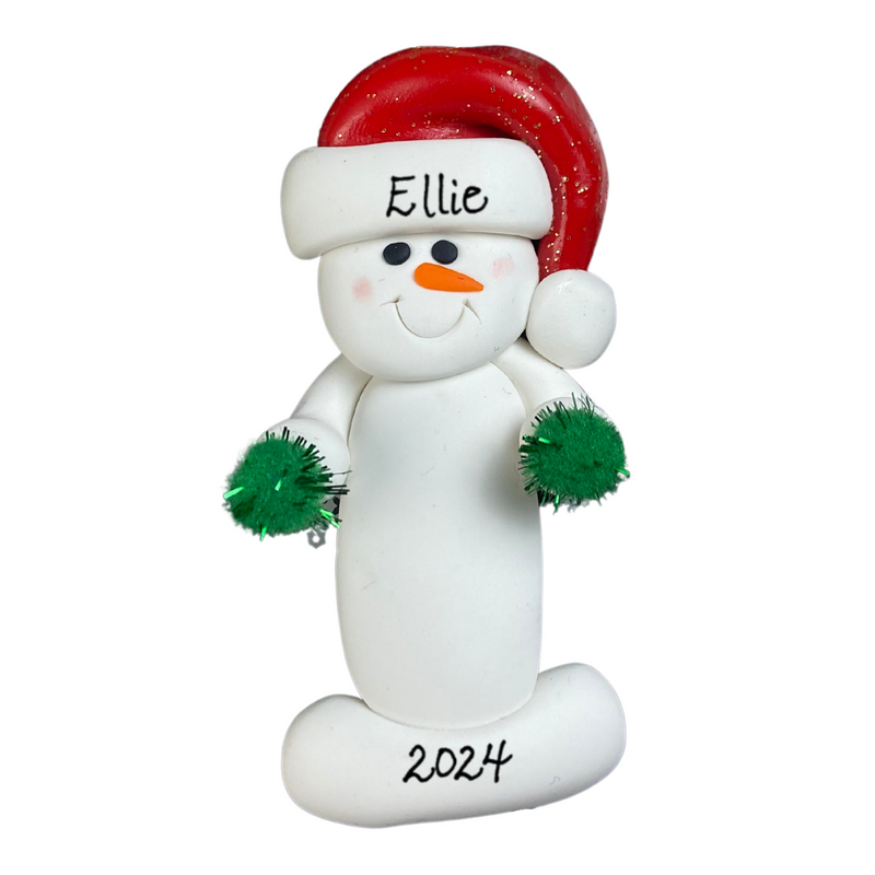 Ornament of white snowman in red hat holding green cheerleader pom-poms, personalized with name.