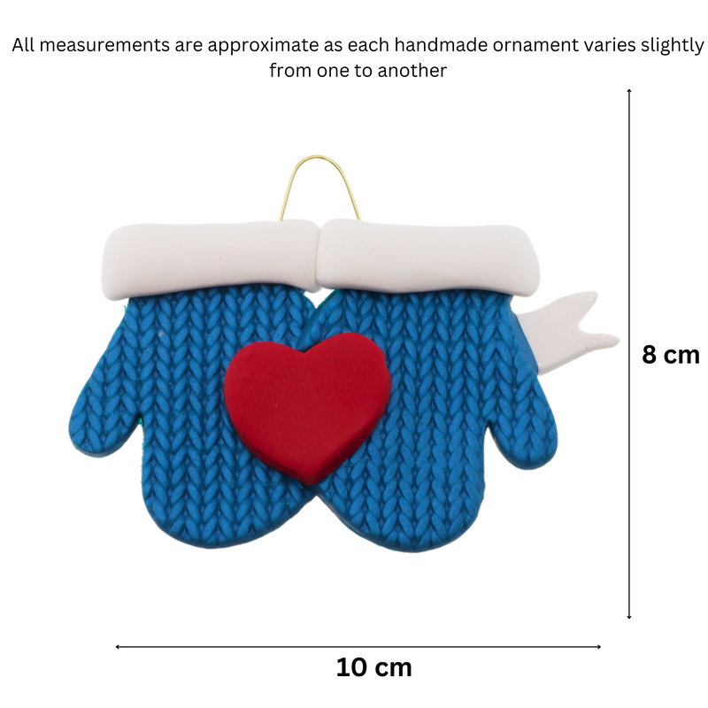 A couple’s ornament of two mittens cradling a heart, graphed to show size (10x8cm).