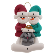 Ornament of snowman couple in red and green shirts and hats with grey dog in Christmas hat, numbered 1-4 for personalization.