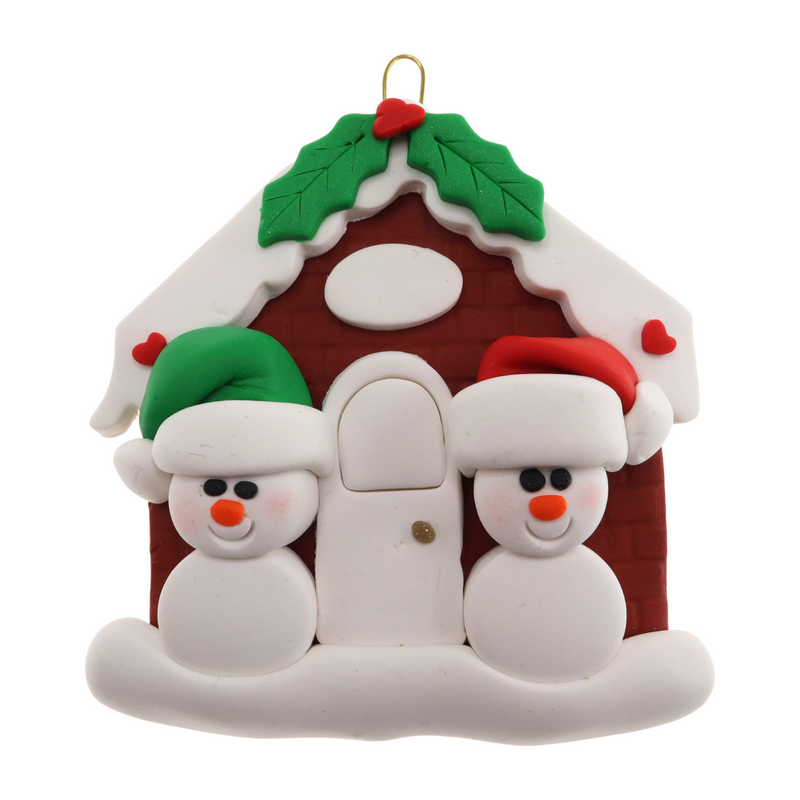 A couple’s ornament of two small white snowmen beside a festive brown house.
