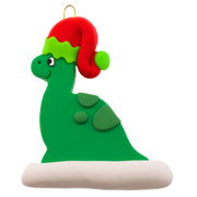 Green dinosaur wearing red festive hat ornament.