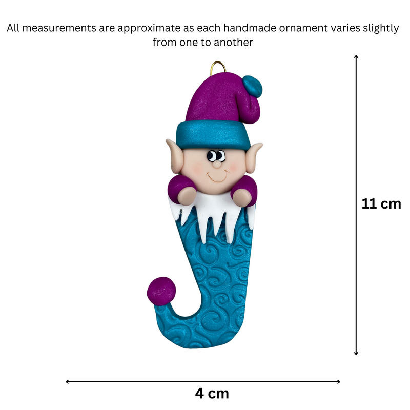 Elf poking out of blue stocking ornament, graphed to show size (4x11cm).