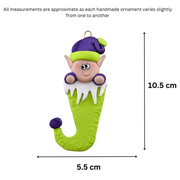 Elf poking out of green stocking ornament, graphed to show size (5.5x10.5cm).
