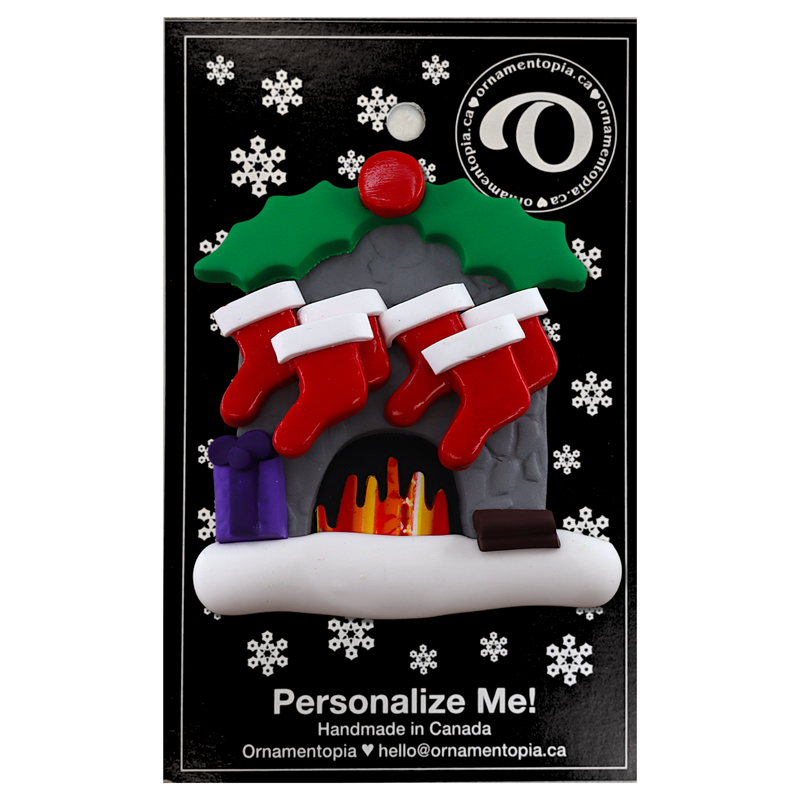 Vibrant fireplace ornament with holly and Christmas presents, displaying 6 red stockings, on display backing card.