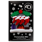 Vibrant fireplace ornament with holly and Christmas presents, displaying 7 red stockings, on display backing card.