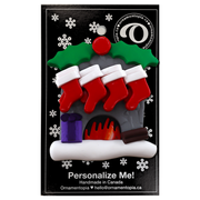 Vibrant fireplace ornament with holly and Christmas presents, displaying 8 red stockings, on display backing card.